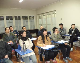 Chinese migrants in their Spanish classroom
